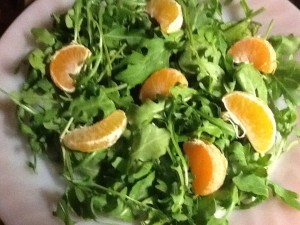 Undressed salad with tangerines