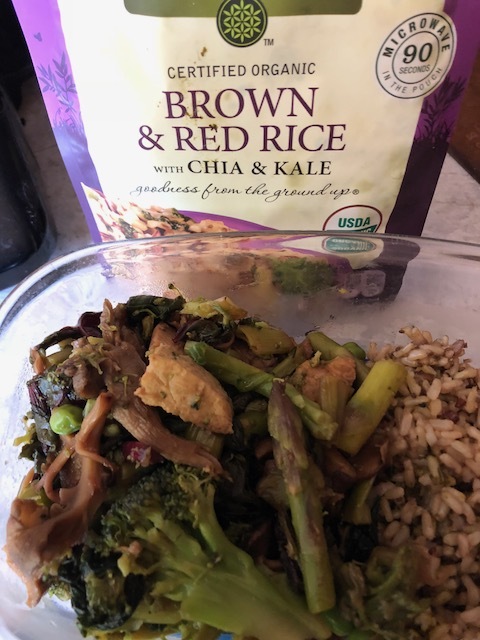Spring Veggies with Tempe cooked in an Instant Pot Pressure Cooker.  Served with Brown and Red Rice with Chia and Kale using leftover vegetables. 