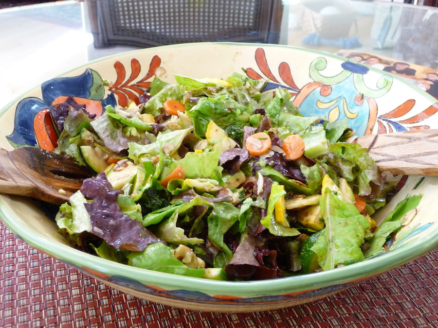 A large bowl of fresh salad. 